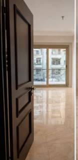 للبيع شقة أرضي مرتفع بمدخلين الدقي