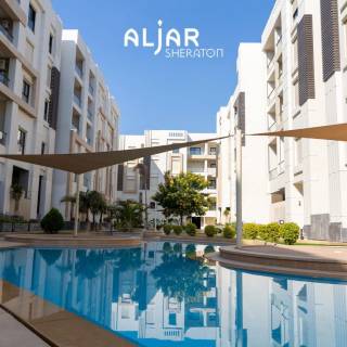 شقة للبيع متشطبة بالتكيفات فة كمبوند الجار Aljar